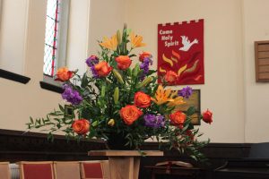 church flowers and banner